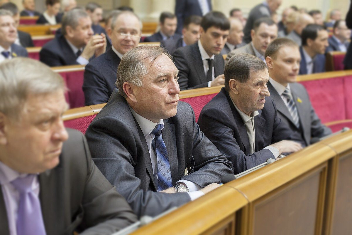 The session hall of the Verkhovna Rada of Ukraine with rows of deputies' seats.