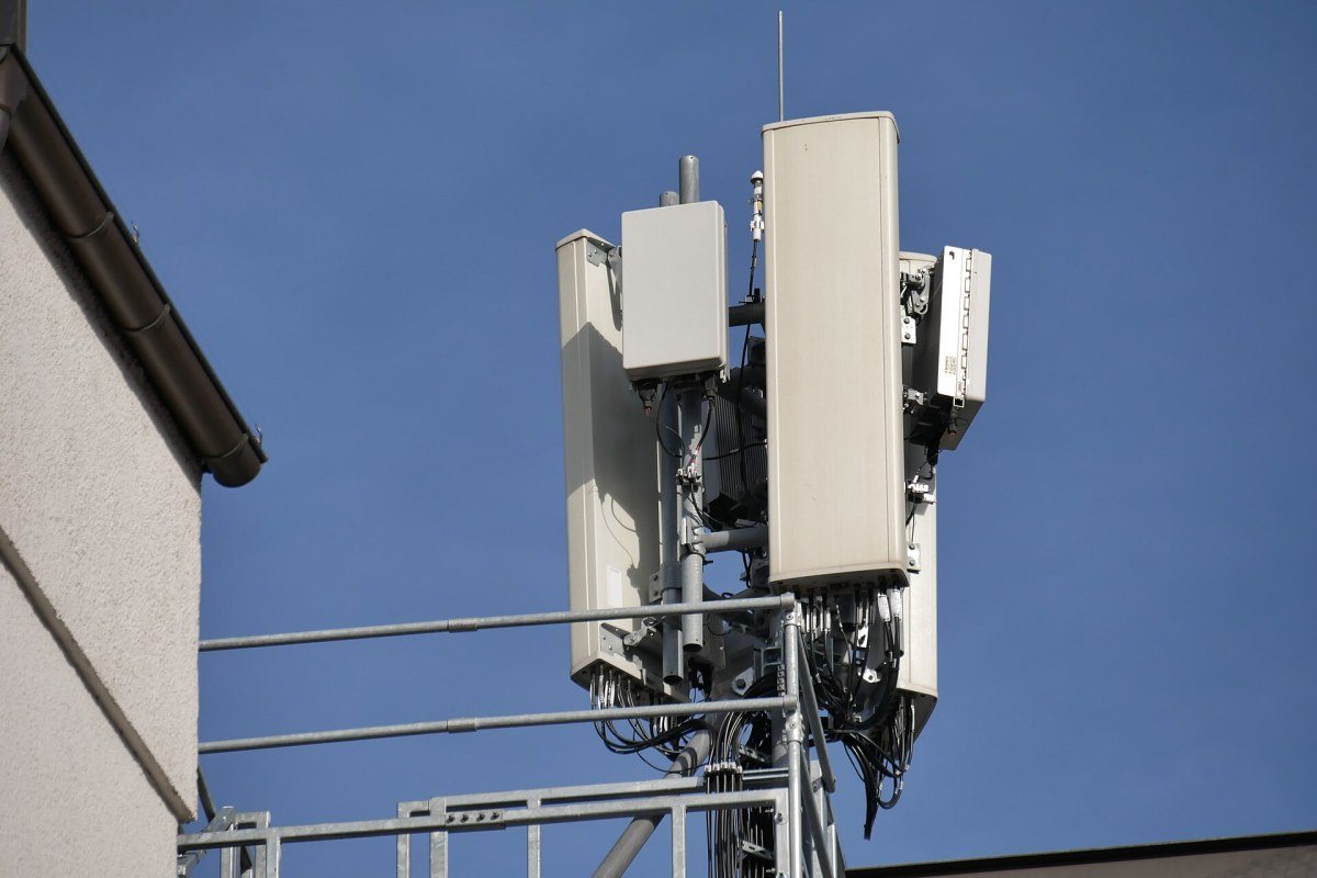 A mobile network antenna installation used for 5G service mounted on a mast.