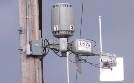A home wireless router with several external antennas.