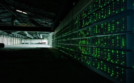 Rows of specialised computers used for cryptocurrency mining on a blockchain network.