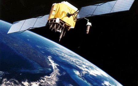 An illustration of a GPS navigation satellite in orbit above the Earth.