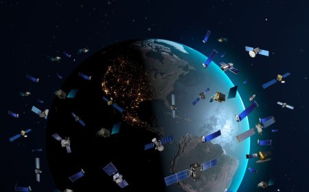 A visualisation of many small satellites orbiting the Earth in a constellation.