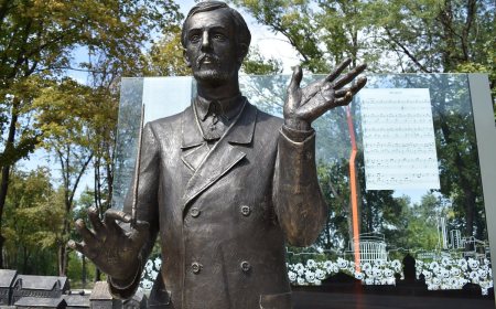 Monument to the Ukrainian composer Mykola Leontovych, author of the Shchedryk arrangement.