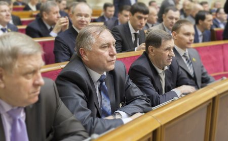 The session hall of the Verkhovna Rada of Ukraine with rows of deputies' seats.